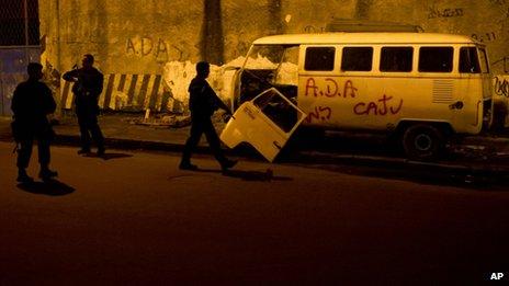 Police in Rio slum, March 3, 2013