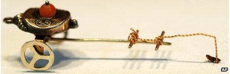 File photo of a flea pulling a circus cart, September 2005