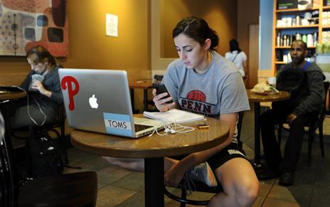 Starbucks customers using smartphones