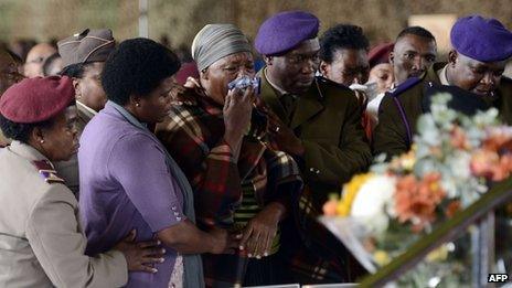 Relatives of the South African soldiers who died during a battle with rebels in the Central African Republic attend a memorial service at the Swartzkop Air Force Base in Pretoria on 2 April 2013