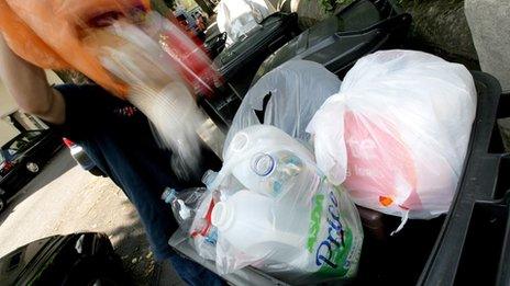 Waste being put in a bin