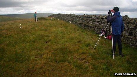 Amateur surveyors John Barnard and Graham Jackson locating the summit of Thack Moor