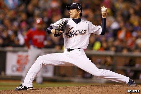 Japan pitches to Puerto Rico in the semi-final of the World Baseball Classic in March 2013