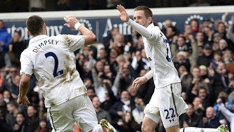 Gylfi Sigurdsson celebrates with Clint Dempsey