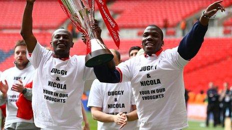 Chuks Aneke and Abdul Osman sport the Adam Dugdale t-shirts