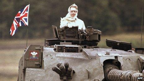 British Prime Minister Margaret Thatcher stands in a British tank during a visit to British forces in Fallingbostel, south of Hamburg, Germany