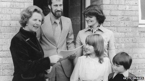 Margaret Thatcher hands over the deeds to the council house belonging to the King family of Milton Keynes, Buckinghamshire, 25th September 1979.