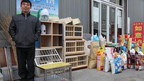 38-year-old Zhang Mingbao has been selling pigeon food and cages for more than ten years at the Tianlong Market in Jijiamiao