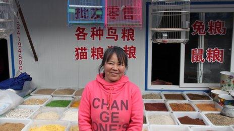 48-year-old Meng Xianghua has been selling birds at Tonghe market for over a decade