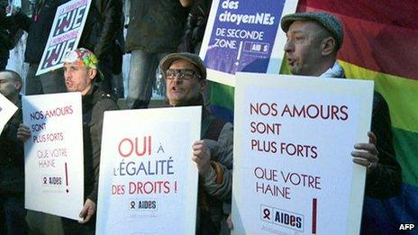 Protesters hold a rally in Paris against critics of a gay marriage bill, claiming they are homophobic