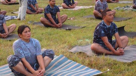 Police officers at yoga class