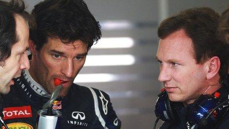 Mark Webber (centre) with Christian Horner (right)