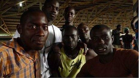 Group of immigrants from Senegal waiting for their visas