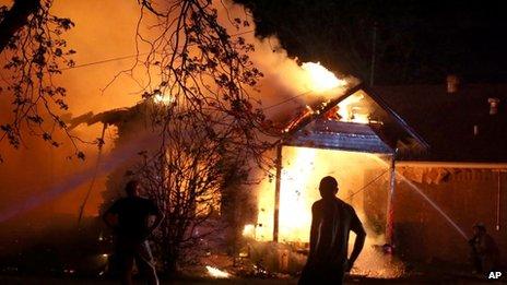 People look on at the Texas blaze