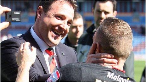 Malky Mackay celebrates with Craig Bellamy