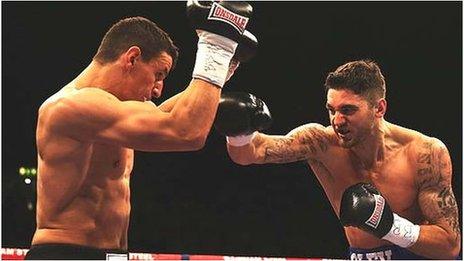 Nathan Cleverly throws a right punch at Robin Krasniqi