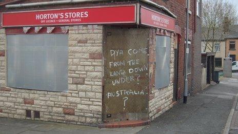 Boarded up corner shop on Portland Street