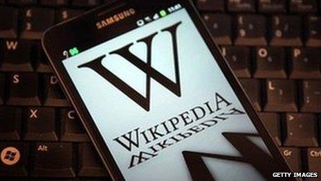 Wikipedia logo on phone