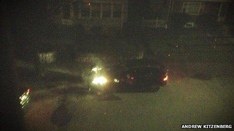 Image of bomb suspects Tamerlan and Dzhokhar Tsarnaev in a gun battle with police on Laurel St, Watertown, in the early hours of 19 April - image courtesy Andrew Kitzenberg