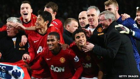 Phil Jones, Shinji Kagawa, Antonio Valencia, Rafael and manager Sir Alex Ferguson of Manchester United celebrate winning the Premier League title after the Barclays Premier League