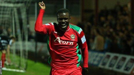 Ismail Yakubu celebrates Newport's late goal