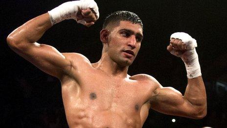 Amir Khan celebrates