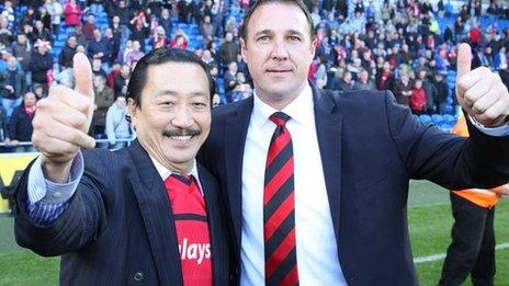 Vincent Tan with Malky Mackay