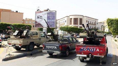 Toyota pick-up trucks mounted with anti-aircraft guns outside the Libyan foreign ministry (April 28 2013)