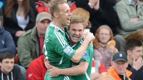 Brett Ormerod celebrates Wrexham’s opening goal with Jay Harris