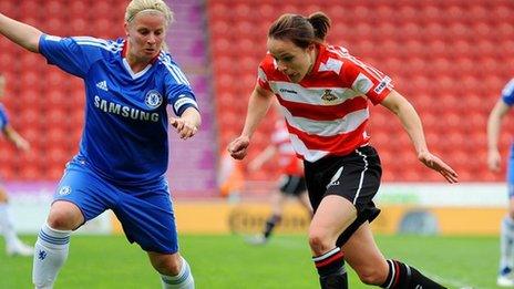 Aine O'Gorman (right) of Doncaster looks for a way past Kylie Davies