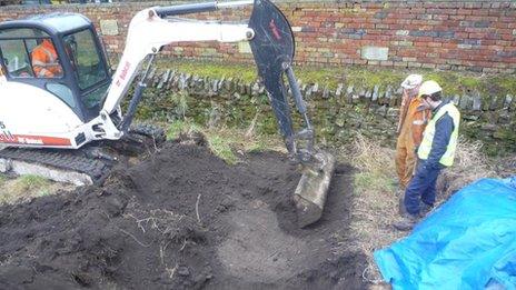 The archaeologists used a digger to excavate the original course of the railway