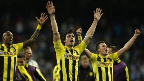 Dortmund's players celebrate at the final whistle