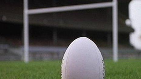 Rugby ball and posts