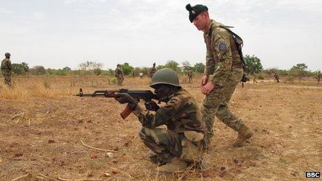 EUTM soldier (r) giving training in Mali, May 2013