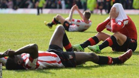 Marcello Trotta (r) after his penalty miss