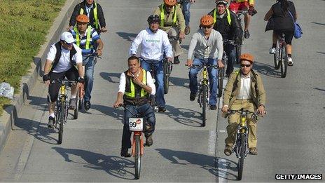 People take part in the Ciclovia in Bogota, Colombia