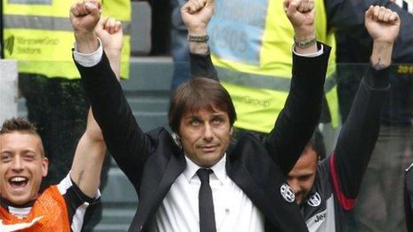 Juventus coach Antonio Conte celebrates his side's title triumph