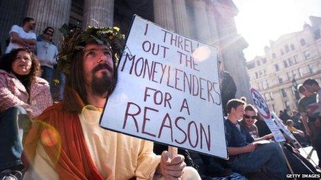 A protester against the banks on the steps of St Paul's Cathedral