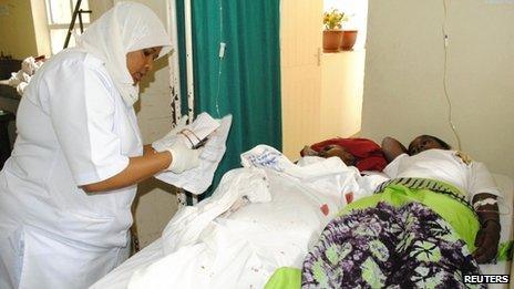 People wounded by the blast receive treatment at a hospital in the northern Tanzanian town of Arusha on 5 May 2013