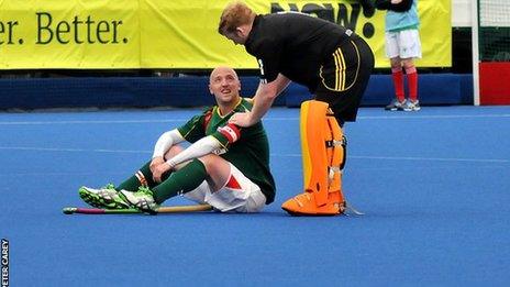 Guernsey skipper Matt Watson is consoled after the loss