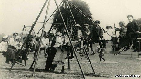 Children on swings in 1920s