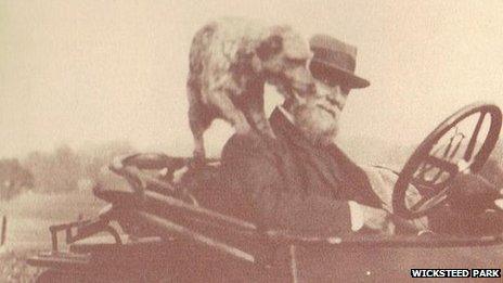 Charles Wicksteed in a car with his dog