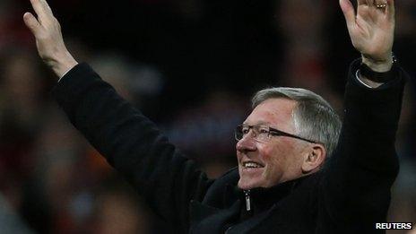 Manchester United"s manager Alex Ferguson celebrates after his team clinched the English Premier League soccer title with a win against Aston Villa at Old Trafford in Manchester. northern England, April 22, 2013.