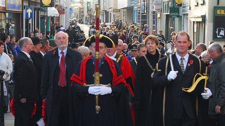John Mattick carrying Carmarthen's ceremonial sword