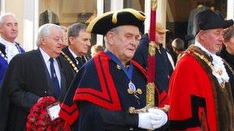 John Mattick carrying Carmarthen's ceremonial sword