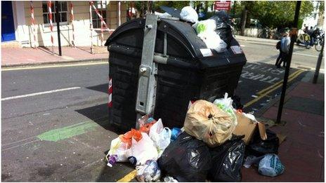 Overflowing rubbish bin in Brighton