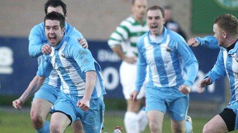 Stephen McCabe celebrates after scoring Warrenpoint's goal