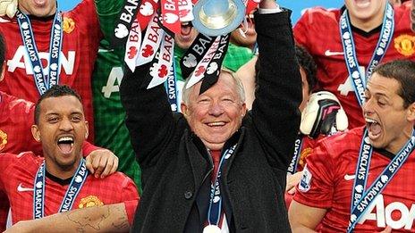 Sir Alex Ferguson lifts the Premier League trophy