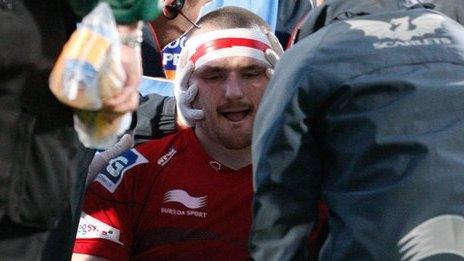 Ken Owens is treated on the pitch at Ravenhill