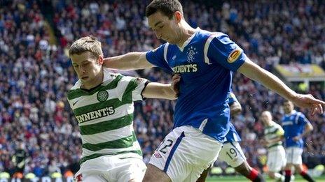 Celtic's Adam Matthews tussles with Rangers defender Lee Wallace